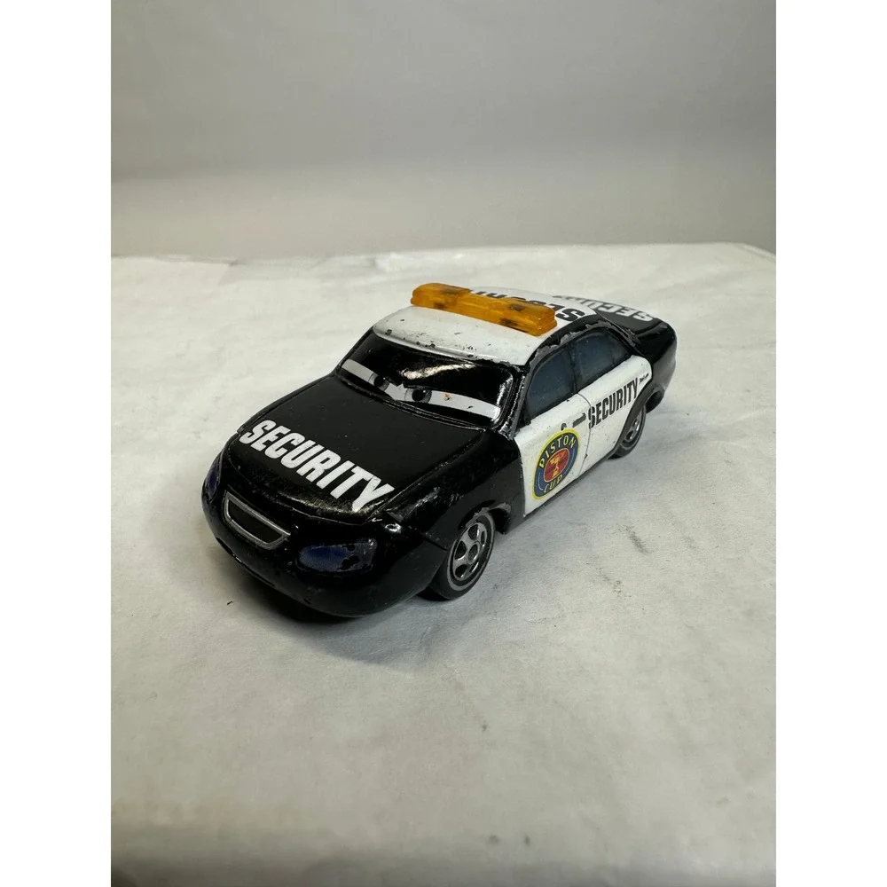 Disney Pixar Cars Marlon Clutches Security Vehicle Black White‎ Piston Cup Toy